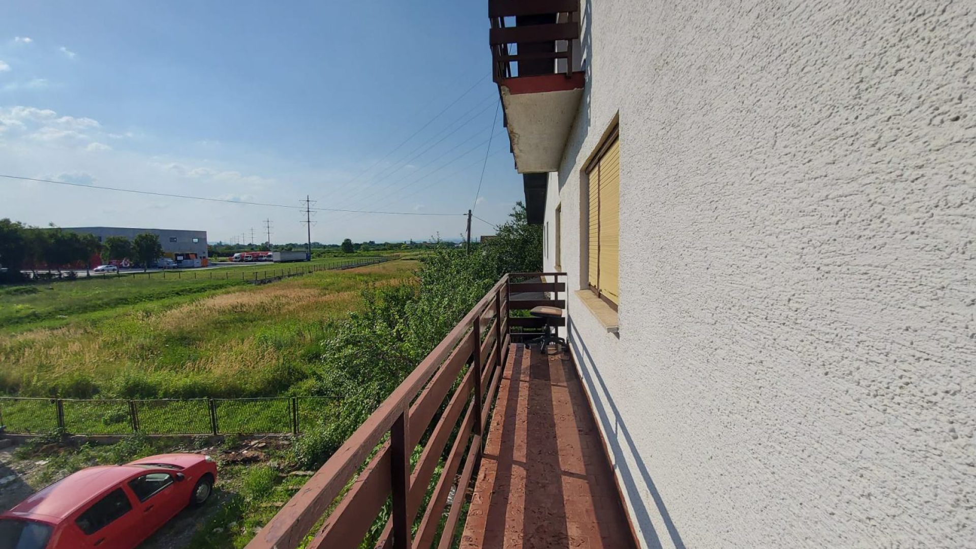 Balkon kuće za najam u Novakima sa pogledom na okolinu